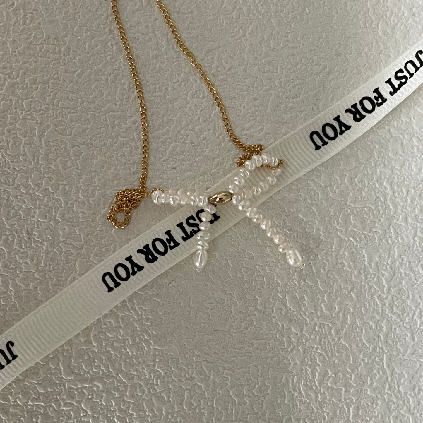3-4mm Rice-Shaped Baroque Freshwater Pearl Bow Necklace