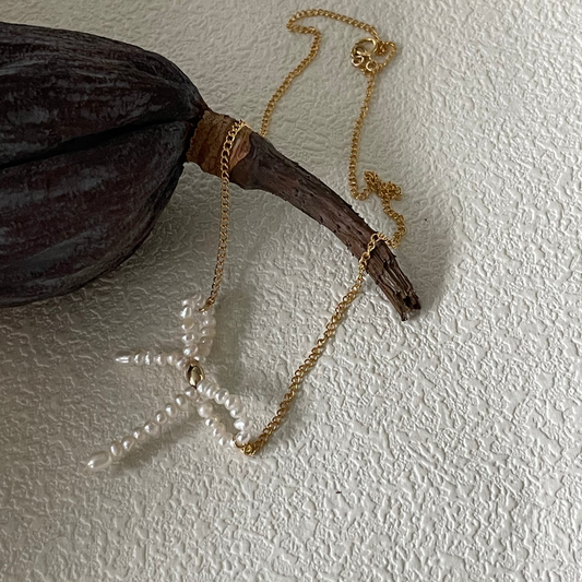3-4mm Rice-Shaped Baroque Freshwater Pearl Bow Necklace