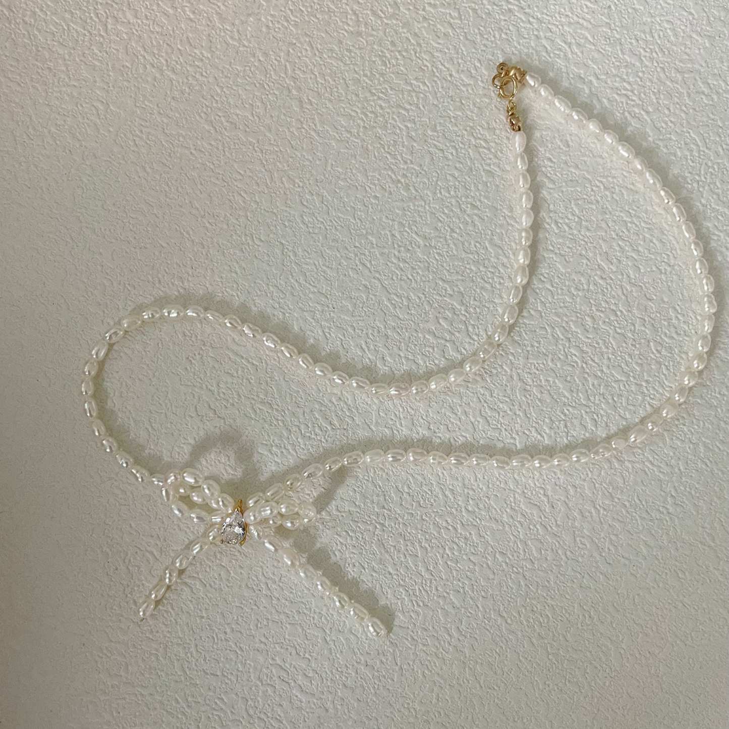 3-4mm Rice-Shaped Baroque Freshwater Pearl 'Sincerest Memories' Bow Necklace