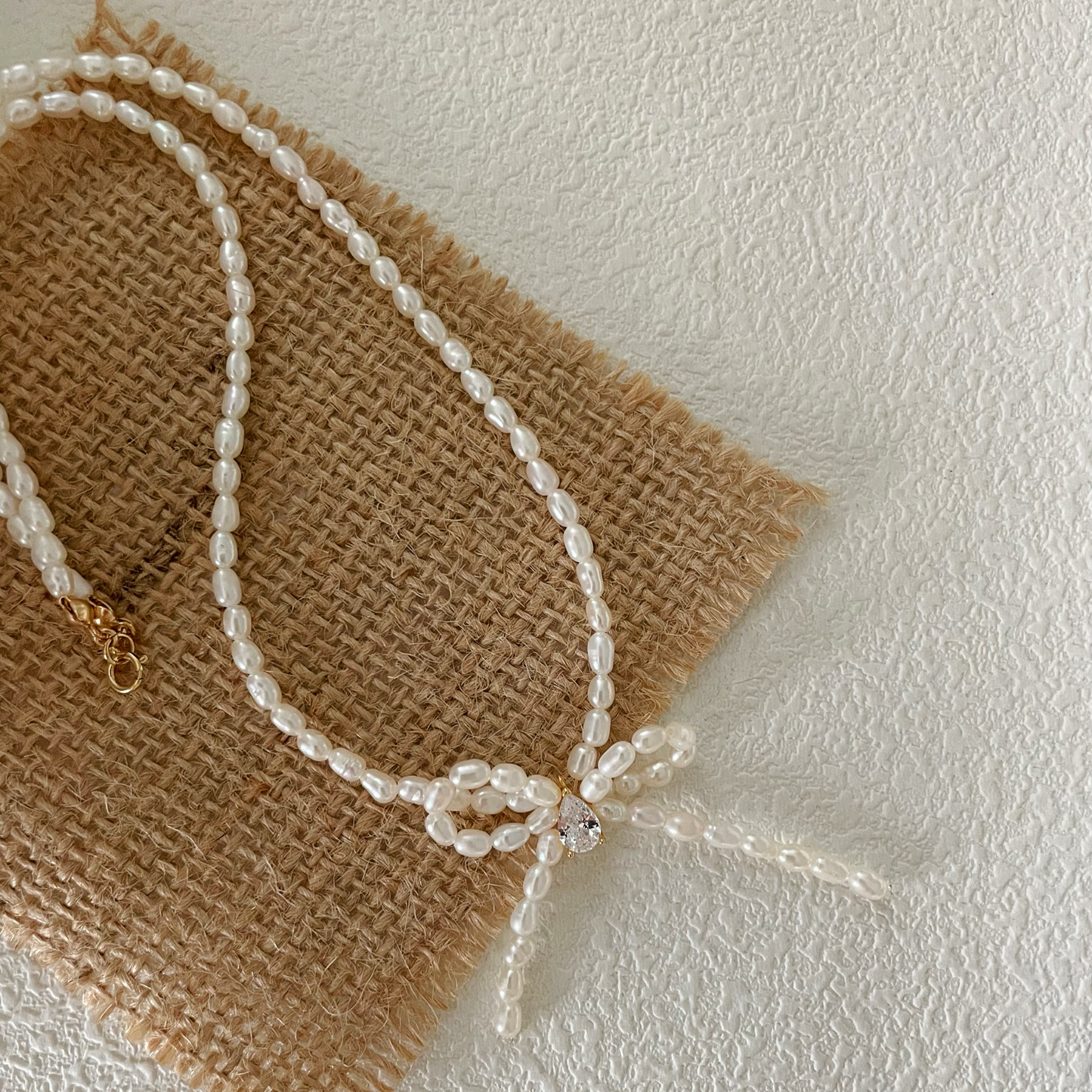 3-4mm Rice-Shaped Baroque Freshwater Pearl 'Sincerest Memories' Bow Necklace