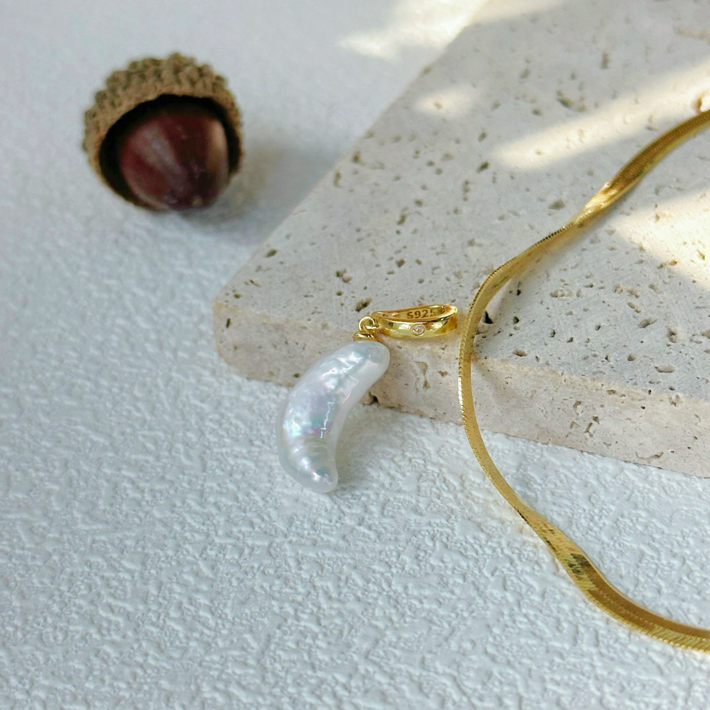 Moon-Shaped Baroque Freshwater Pearl Snake Bone Necklace
