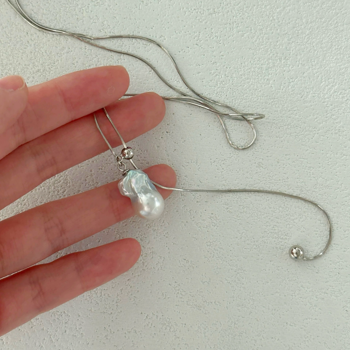 18-22mm Cold White Baroque Freshwater Pearl Drawstring Silver Ball Necklace